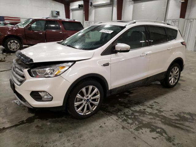 FORD ESCAPE TIT 2017 with VIN 1FMCU0J97HUE21504 - Photo from auction