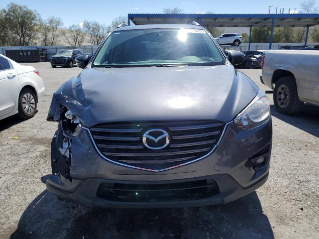 Photo 5 from auction – 2016 MAZDA CX-5 TOURI with VIN JM3KE2CY8G0811389