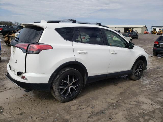 Photo 3 from auction – 2018 TOYOTA RAV4 SE with VIN JTMJFREV9JJ187939