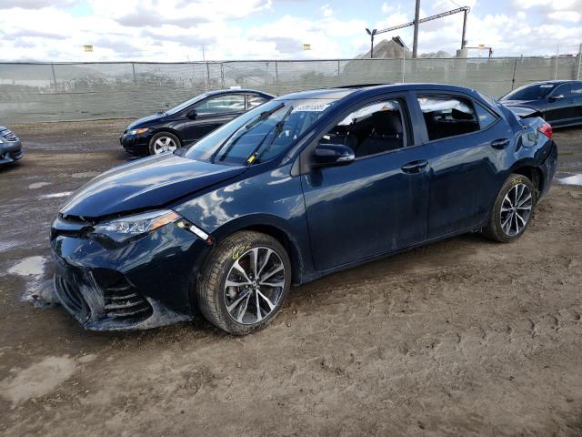 TOYOTA COROLLA L 2017 with VIN 5YFBURHE8HP676523 - Photo from auction
