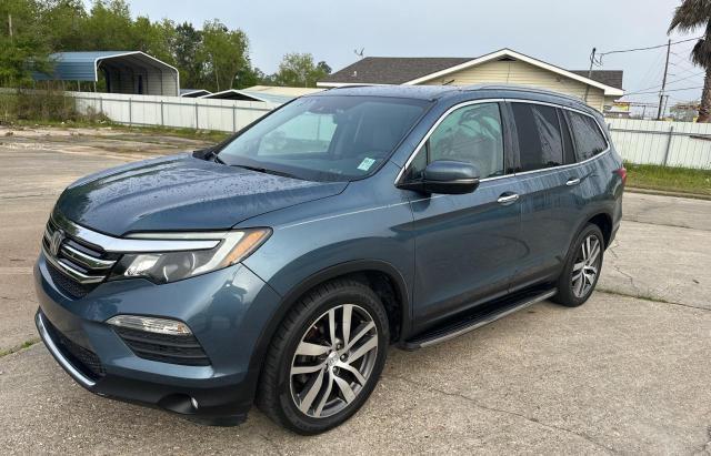 Photo 2 from auction – 2016 HONDA PILOT TOUR with VIN 5FNYF6H96GB089902