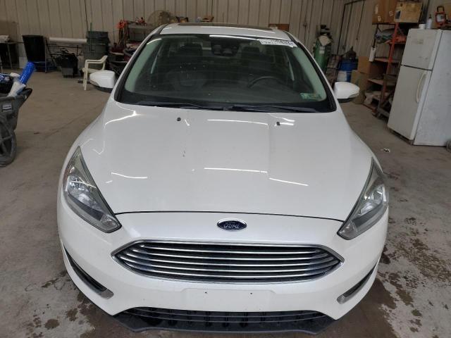 Photo 5 from auction – 2016 FORD FOCUS TITA with VIN 1FADP3J28GL274463