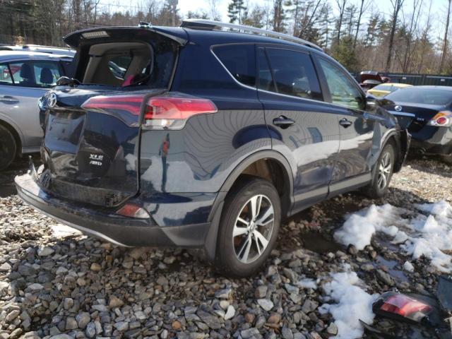 Photo 3 from auction – 2017 TOYOTA RAV4 XLE with VIN JTMRFREV9HJ716173