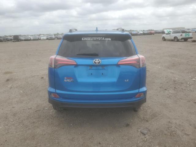 Photo 6 from auction – 2018 TOYOTA RAV4 LE with VIN JTMZFREV7JJ157549