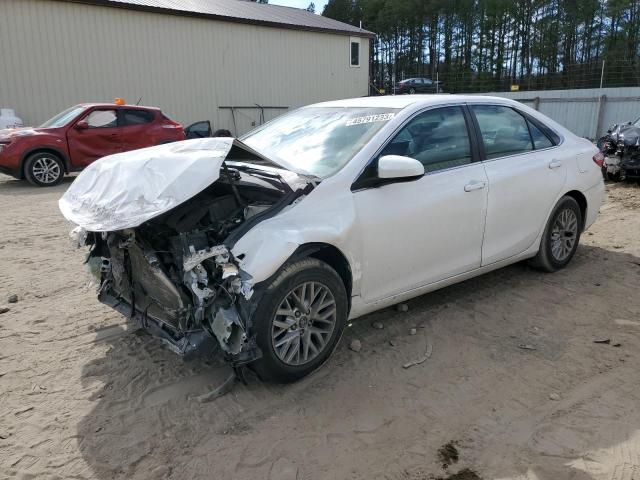 TOYOTA CAMRY LE 2017 with VIN 4T1BF1FKXHU687199 - Photo from auction