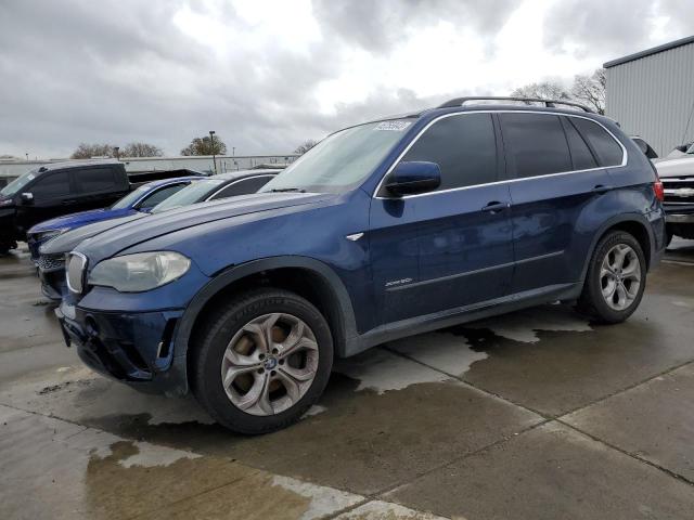 BMW X5 XDRIVE5 2011 with VIN 5UXZV8C58BL418434 - Photo from auction