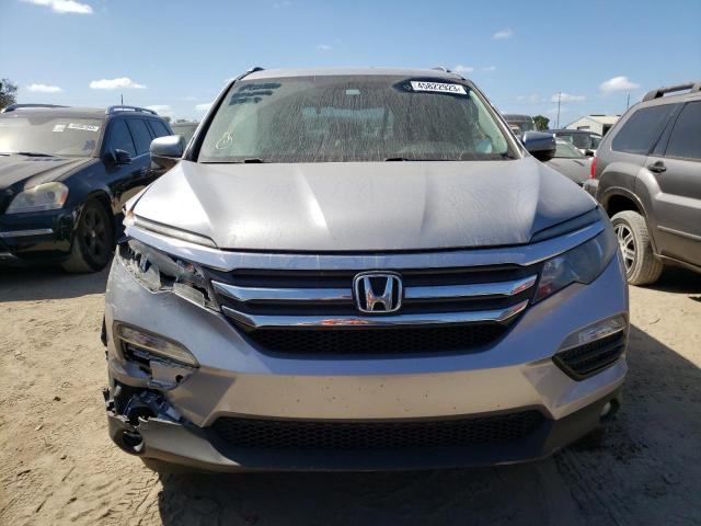 Photo 5 from auction – 2017 HONDA PILOT EXL with VIN 5FNYF5H5XHB015701