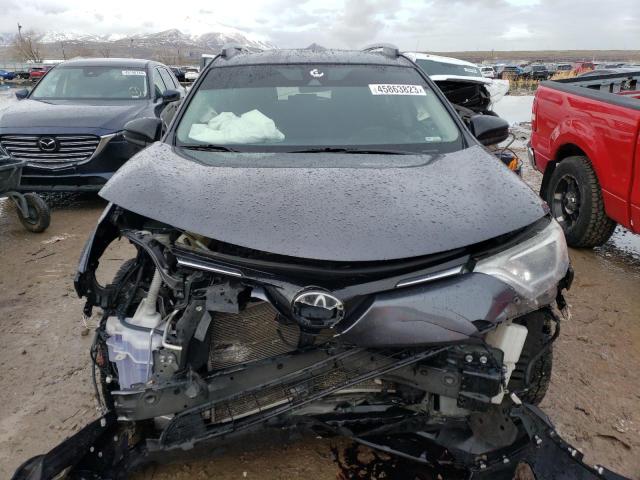 Photo 5 from auction – 2017 TOYOTA RAV4 LE with VIN JTMBFREV5HJ145931