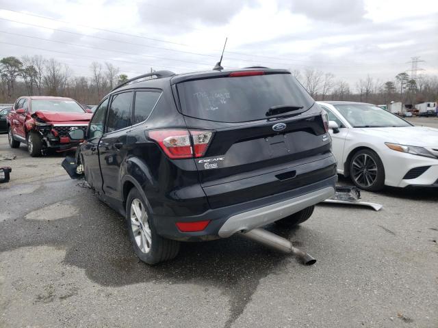Photo 2 from auction – 2018 FORD ESCAPE SE with VIN 1FMCU9GD0JUC54330