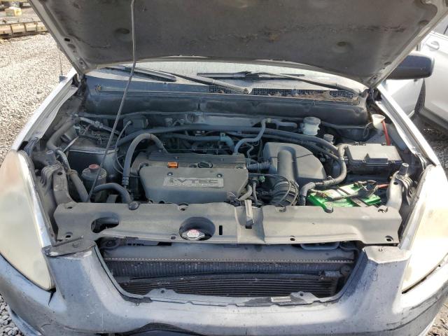 Photo 11 from auction – 2004 HONDA CR-V LX with VIN JHLRD77504C019953