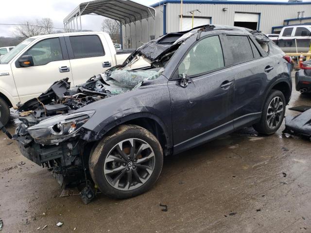 MAZDA CX-5 GT 2016 with VIN JM3KE2DY1G0667859 - Photo from auction