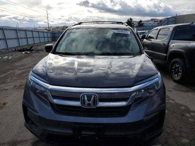 Photo 5 from auction – 2019 HONDA PILOT LX with VIN 5FNYF6H10KB070717