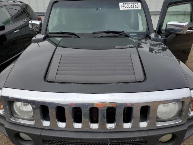 Photo 12 from auction – 2006 HUMMER H3 with VIN 5GTDN136768138565