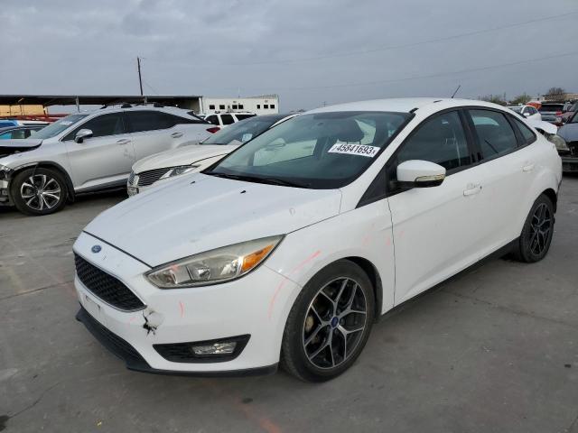 FORD FOCUS SE 2015 with VIN 1FADP3F26FL327474 - Photo from auction