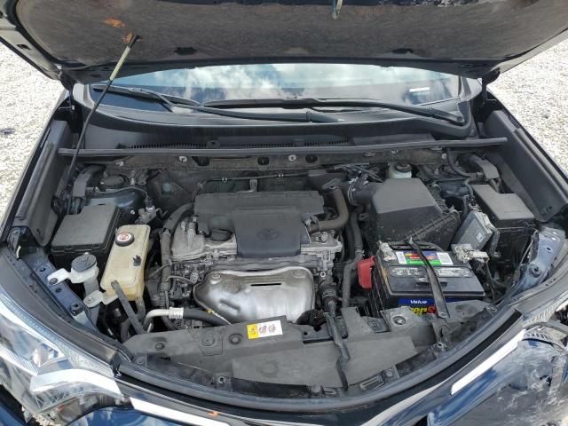 Photo 11 from auction – 2018 TOYOTA RAV4 LE with VIN JTMZFREV1JJ155649