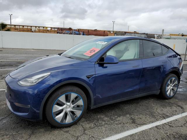 TESLA MODEL Y 2022 with VIN 7SAYGAEE3NF432294 - Photo from auction