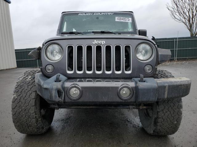 Photo 5 from auction – 2016 JEEP WRANGLER U with VIN 1C4BJWEG5GL223500