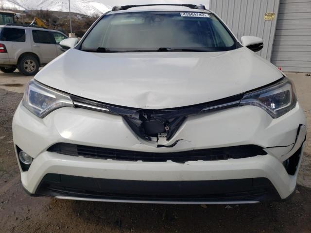 Photo 5 from auction – 2018 TOYOTA RAV4 LIMIT with VIN JTMDFREV0JJ176549