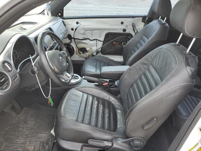 Photo 7 from auction – 2014 VOLKSWAGEN BEETLE with VIN 3VWJ17AT3EM655242