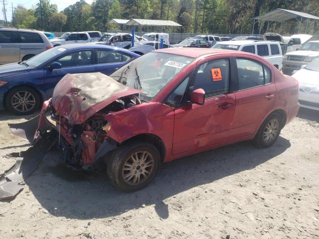 SUZUKI SX4 LE 2012 with VIN JS2YC5A37C6302067 - Photo from auction