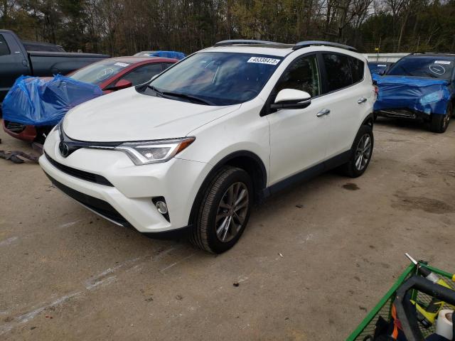 TOYOTA RAV4 LIMIT 2018 with VIN JTMYFREV7JJ749335 - Photo from auction