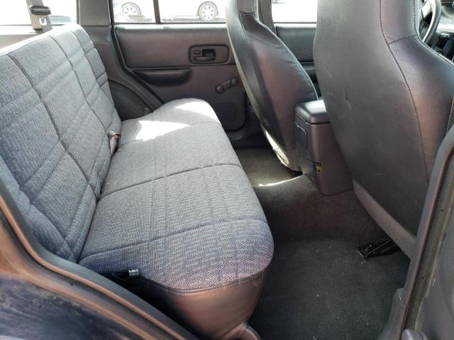 Photo 11 from auction – 1999 JEEP CHEROKEE S with VIN 1J4FF28S8XL521318