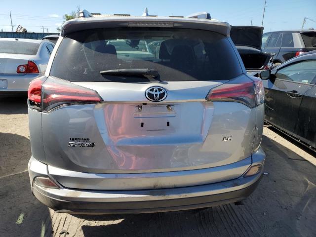 Photo 6 from auction – 2018 TOYOTA RAV4 LE with VIN JTMZFREV2JJ169074