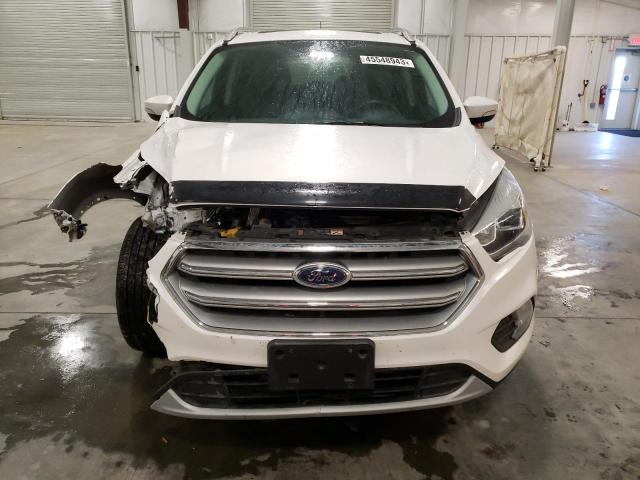 Photo 5 from auction – 2017 FORD ESCAPE TIT with VIN 1FMCU0J97HUE21504