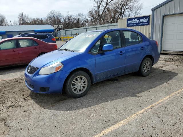 SUZUKI SX4 LE 2012 with VIN JS2YC5A34C6303645 - Photo from auction