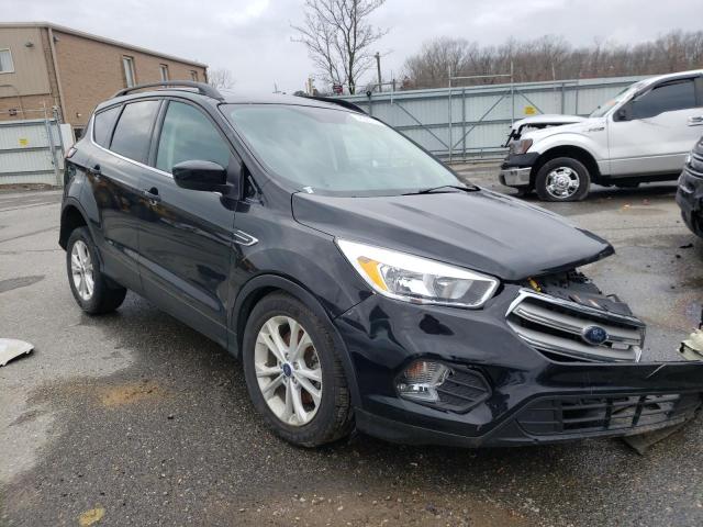 Photo 4 from auction – 2018 FORD ESCAPE SE with VIN 1FMCU9GD0JUC54330