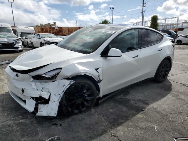 TESLA MODEL Y 2022 with VIN 7SAYGDEE9NA019908 - Photo from auction