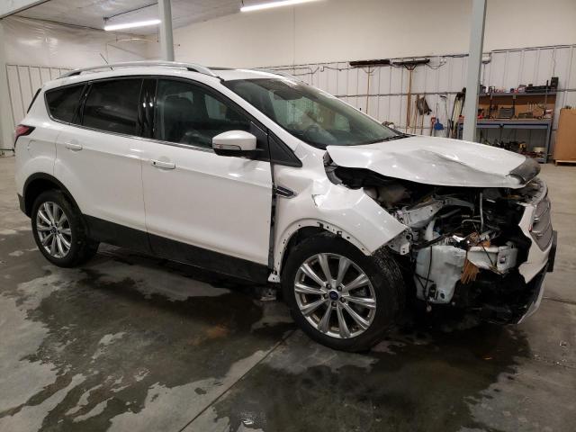 Photo 4 from auction – 2017 FORD ESCAPE TIT with VIN 1FMCU0J97HUE21504