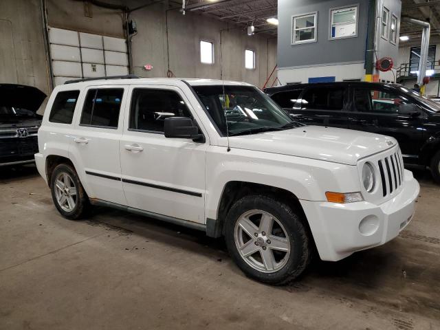Photo 4 from auction – 2010 JEEP PATRIOT with VIN 1J4NF2GB7AD580164