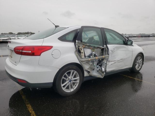 Photo 3 from auction – 2018 FORD FOCUS SE with VIN 1FADP3F28JL271191