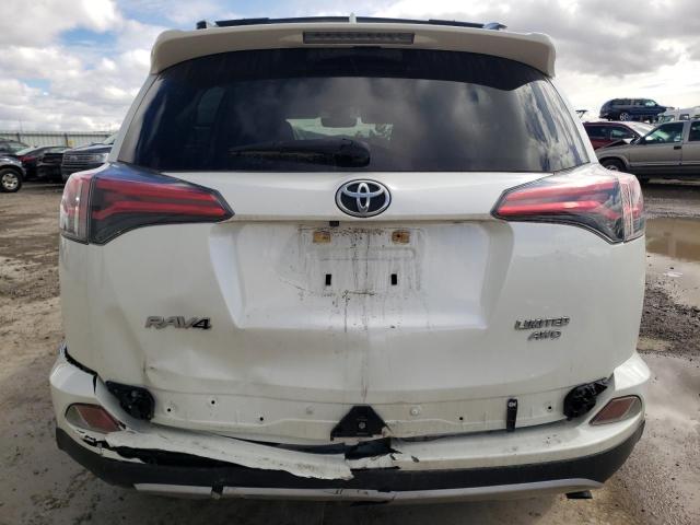 Photo 6 from auction – 2018 TOYOTA RAV4 LIMIT with VIN JTMDFREV0JJ176549