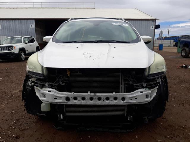 Photo 5 from auction – 2014 FORD ESCAPE TIT with VIN 1FMCU0JXXEUB01670
