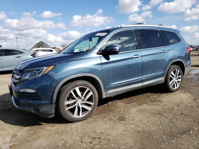 HONDA PILOT ELIT 2016 with VIN 5FNYF6H01GB028653 - Photo from auction