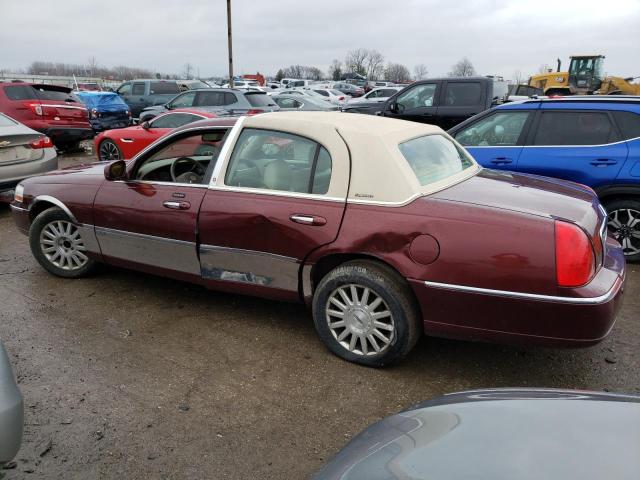 Photo 2 from auction – 2004 LINCOLN TOWN CAR E with VIN 1LNHM81W24Y609988