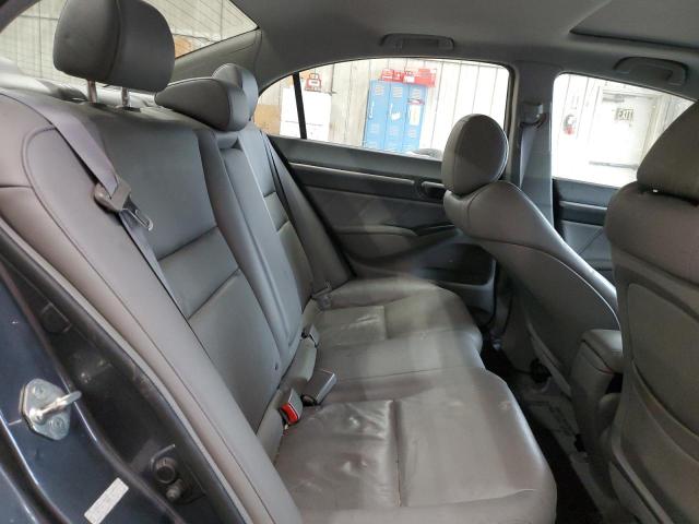 Photo 10 from auction – 2010 HONDA CIVIC EXL with VIN 19XFA1F98AE065111