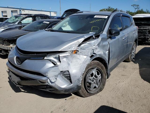 TOYOTA RAV4 LE 2018 with VIN JTMZFREV2JJ169074 - Photo from auction