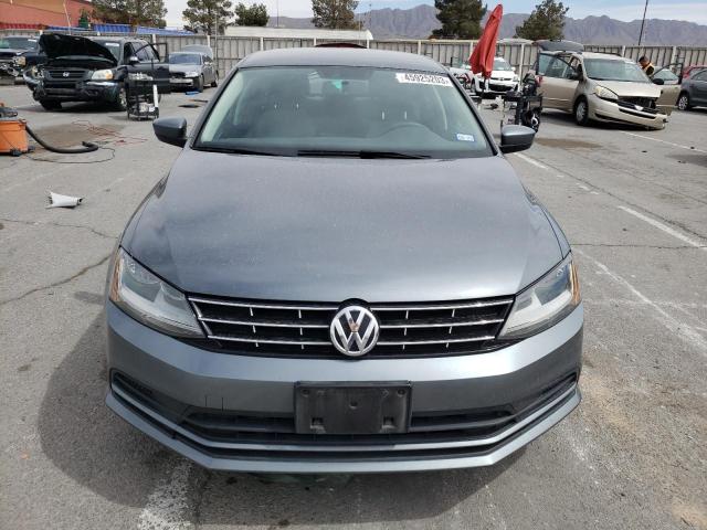 Photo 5 from auction – 2018 VOLKSWAGEN JETTA S with VIN 3VW2B7AJ4JM260979