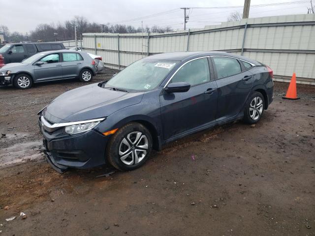 HONDA CIVIC LX 2018 with VIN 2HGFC2F54JH590413 - Photo from auction