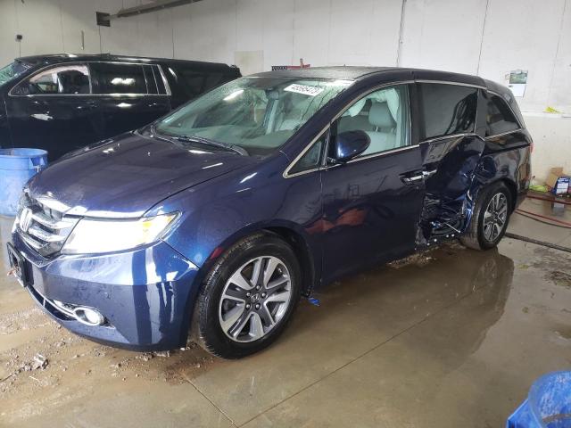 HONDA ODYSSEY TO 2014 with VIN 5FNRL5H94EB048642 - Photo from auction
