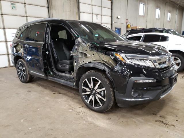 Photo 4 from auction – 2021 HONDA PILOT ELIT with VIN 5FNYF6H03MB033168