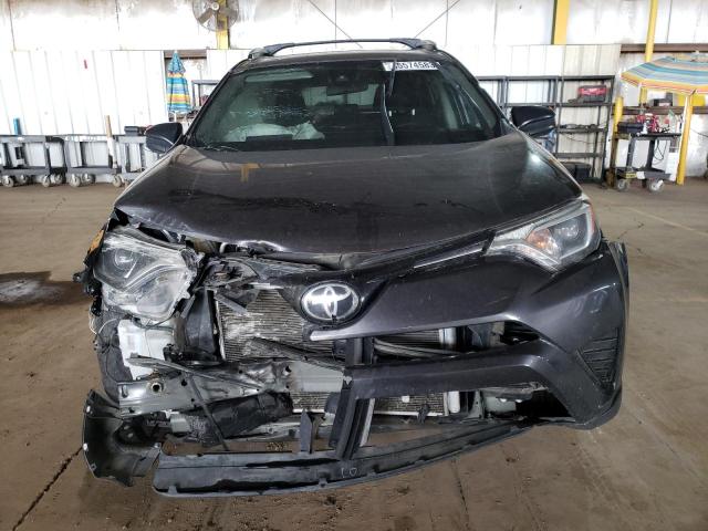 Photo 5 from auction – 2018 TOYOTA RAV4 LE with VIN JTMZFREVXJJ722473