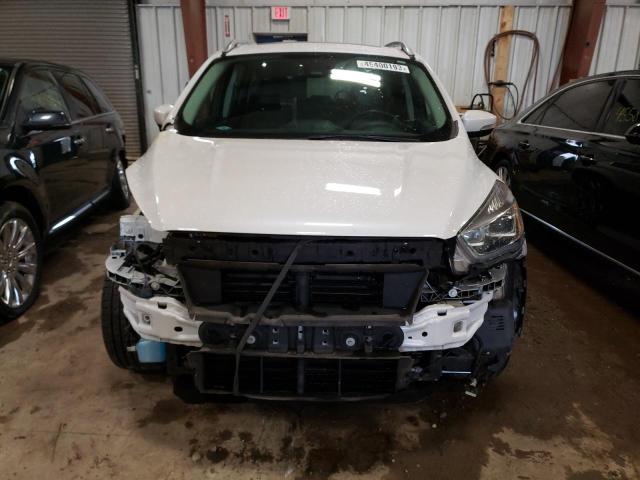 Photo 5 from auction – 2017 FORD ESCAPE TIT with VIN 1FMCU9JD0HUE31560