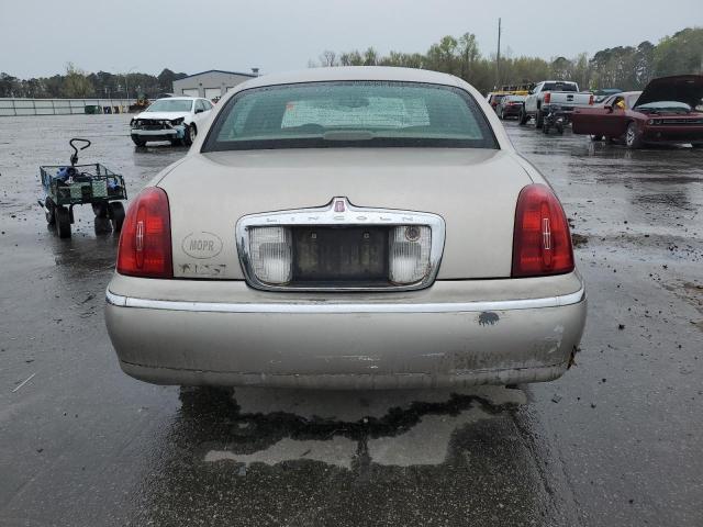 Photo 6 from auction – 2002 LINCOLN TOWN CAR E with VIN 1LNHM81W92Y603523