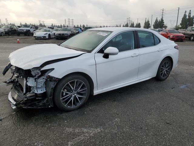 TOYOTA CAMRY 2022 with VIN 4T1G11AK5NU042824 - Photo from auction
