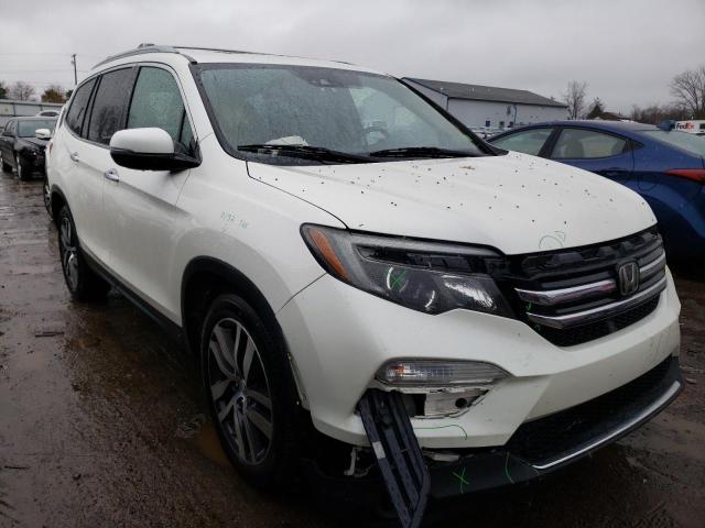 Photo 4 from auction – 2016 HONDA PILOT ELIT with VIN 5FNYF6H05GB055032
