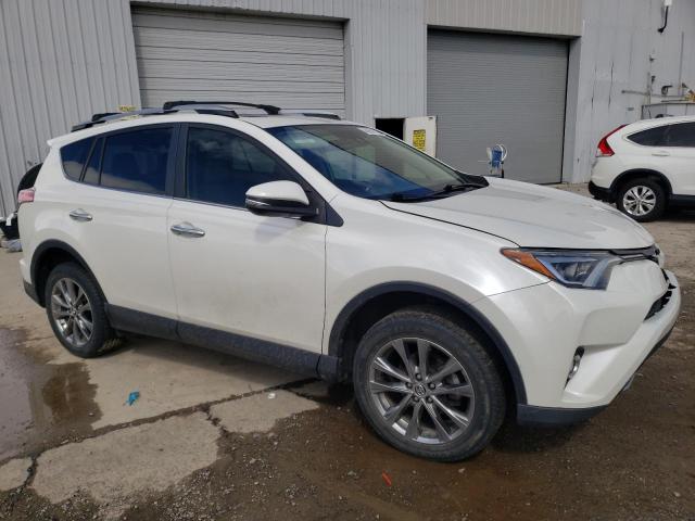 Photo 4 from auction – 2018 TOYOTA RAV4 LIMIT with VIN JTMDFREV0JJ176549